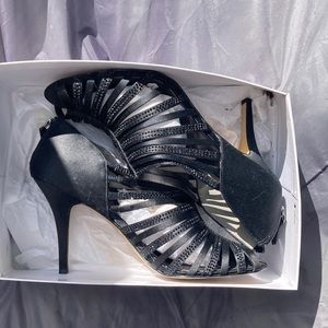 Nine West  black rhinestone and strap ie black heels. In silk